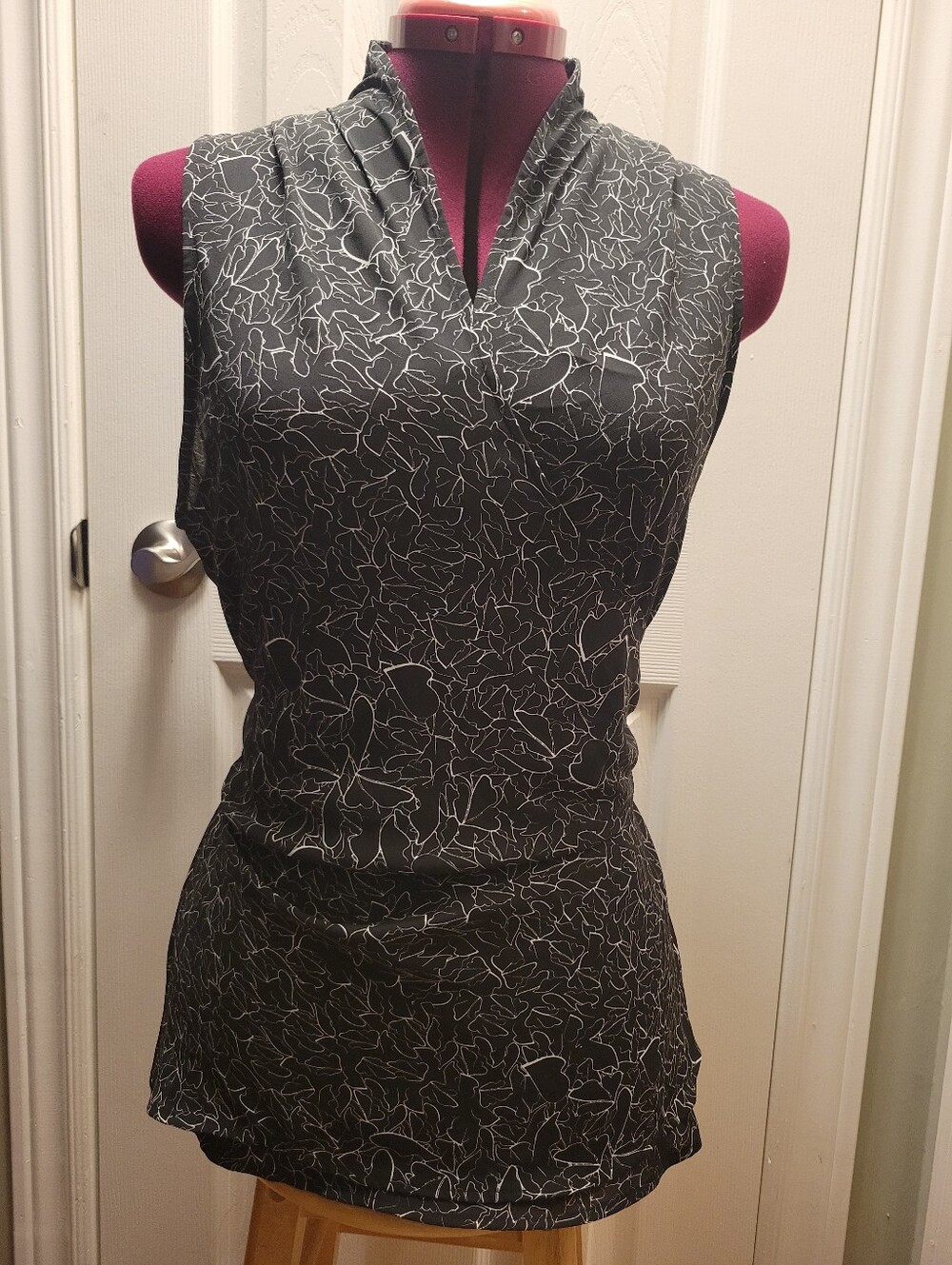 Sleeveless Black V-Neck Wrap Around Patterned Blouse